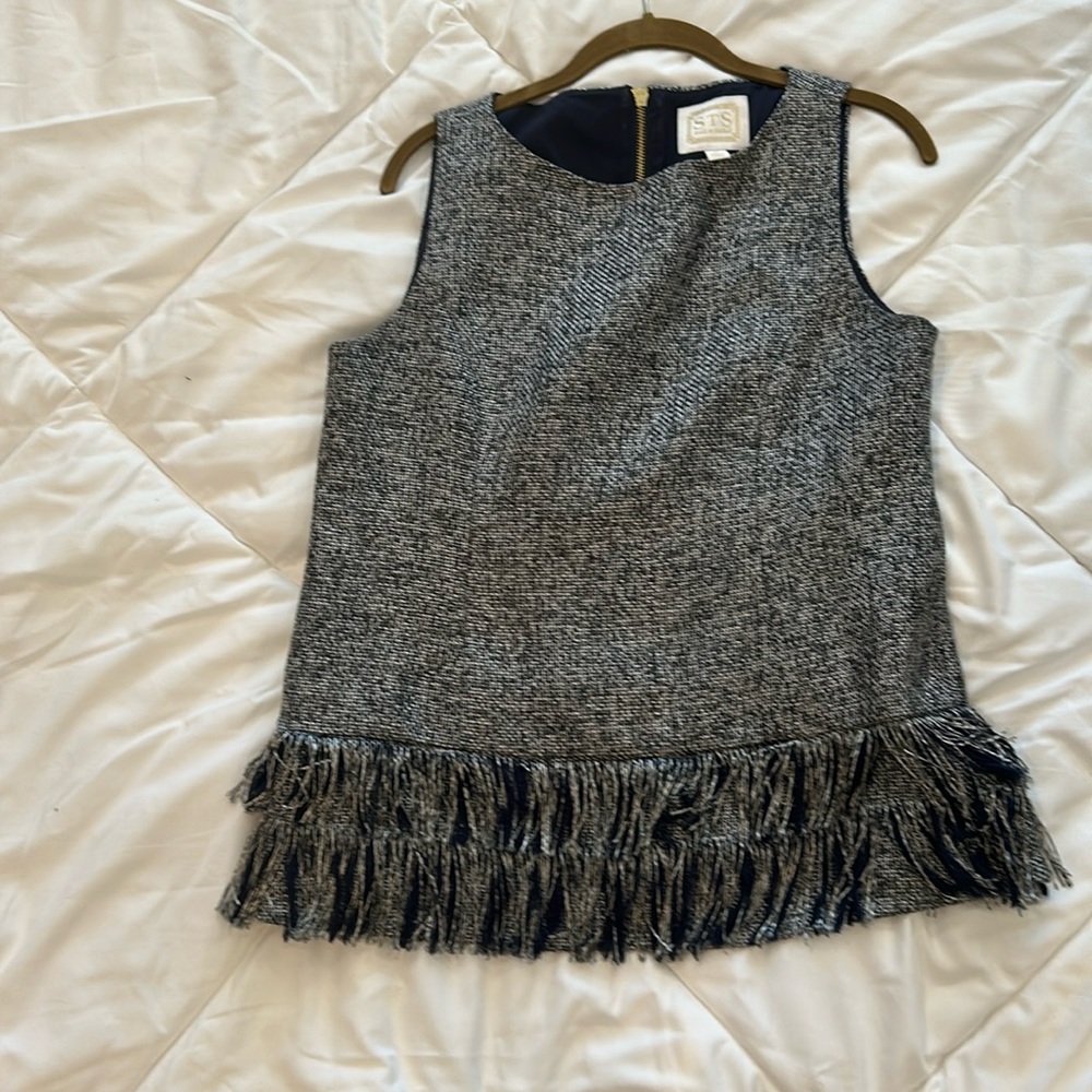 Sail to Sable too with fringe on bottom. Gold back Zipper Size M